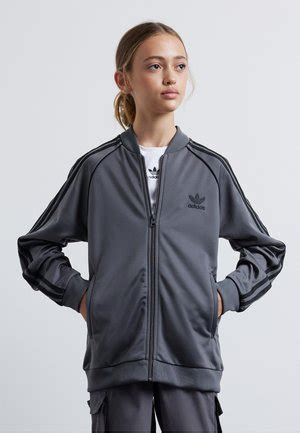 adidas kinderjacke schwarz|Adidas Kinderjacken für jedes Wetter online kaufen .